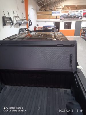Tapa plegable